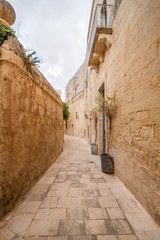 Silent and magical alley in Mdina, Malta