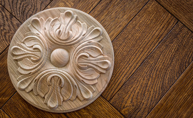 Wood processing. Joinery work. wood carving. the carving object on the wooden background