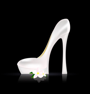 white shoe and flower