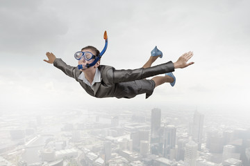 Businesswoman diver in free fall