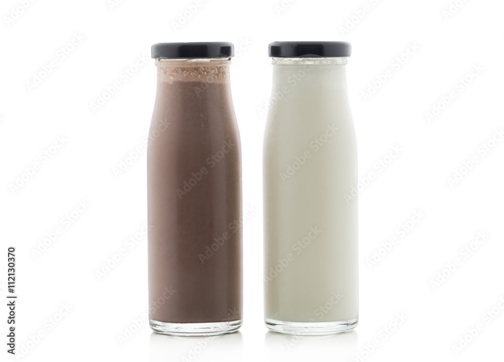 Wall mural glass milk and milk chokolate bottle isolated on white background with clipping path