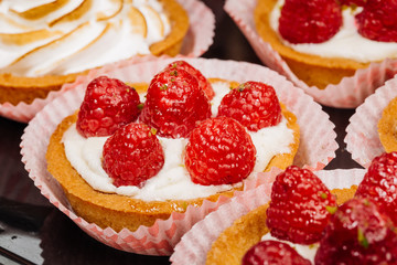 sweet basket with cream and raspberries
