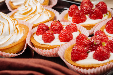 sweet basket with cream and raspberries