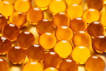 Abstract photo of amber color pills