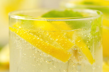 Refreshing drink with lemon, ice and mint