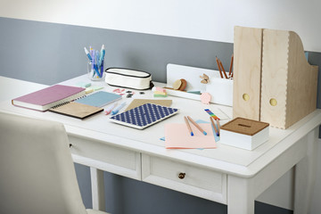 Office and school set with stationery and notebooks on a table