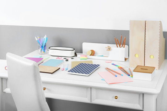 Office and school set with stationery and notebooks on a table