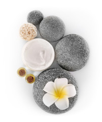 Fototapeta na wymiar Spa treatment with stones and cream isolated on white