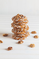 Oatmeal cookies on the white wooden table.