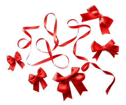 Red ribbon and bows on a white background