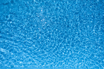 Blue water abstract in swimming pool