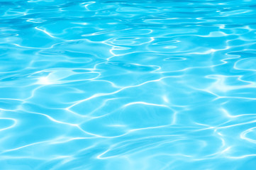 Blue water abstract, Blue water in swimming pool, Ripple water in swimming pool with sun reflection