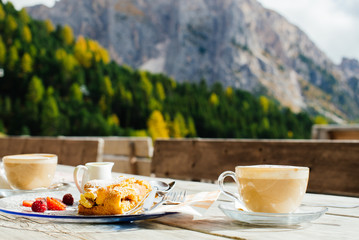 Fragrant coffee and strudel for breakfast in the Alps