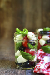 Caprese salad in a mason jar.