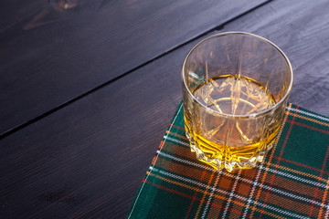 Scotch whisky on tartan