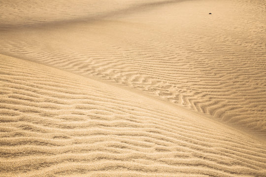 Sandy dunes in famous natural Maspalomas beach, Gran Canaria. Sp