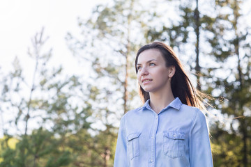 female relaxing in nature