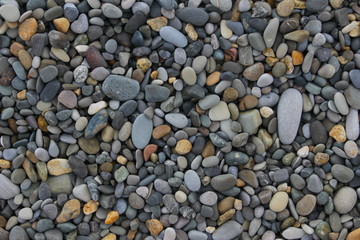 stones background. wall pattern of gravel stone