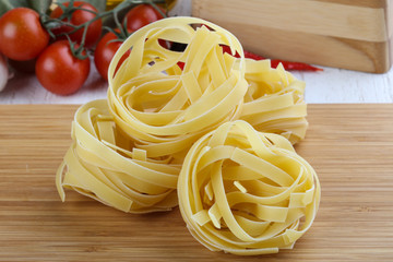 Raw fettuccine pasta