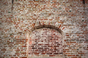 bow window on brick wall