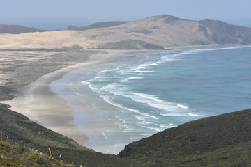 Flat sandy beaches of most northern part of New Zealand at Cape Reinga.