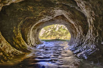 Fotobehang Cave Stream © Fyle