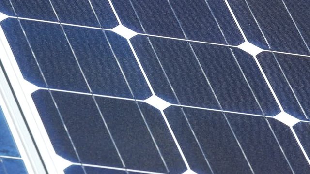 Blue cells on the solar panel outside. Solar panel refers to a panel designed to absorb the suns rays as a source of energy for generating electricity or heating.