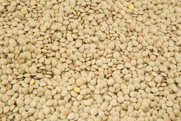 raw lentils scattered as background