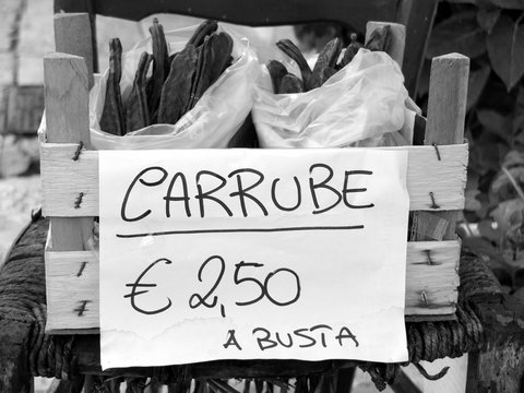 Sale on the street of the carob