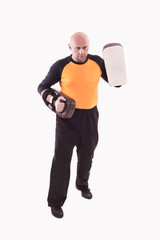 Trainer holding kick-shield