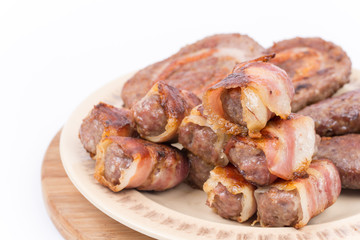 Mixed grilled meat on the plate