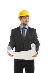 Engineer in helmet holding blueprint isolated on white