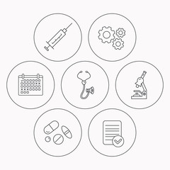 Syringe, stethoscope and microscope icons.