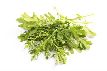 Fresh arugula leaves on white background