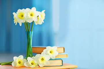 White narcissus in vase on the table indoors