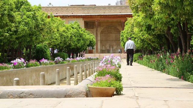 in iran fountain and old antique mosque flower and plant persian architecture.