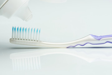 close up of tooth brush and paste