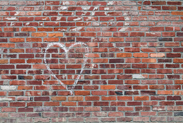 White Chalk Heart on a Red Brick Wall