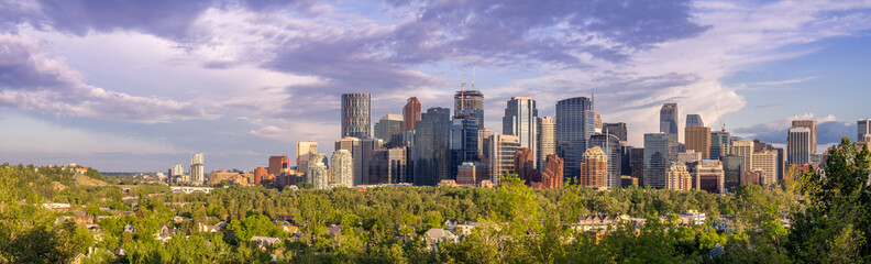View of the Calgary skyline  in the evening with parkland in the foreground.