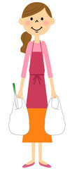 買い物するエプロンの女性    