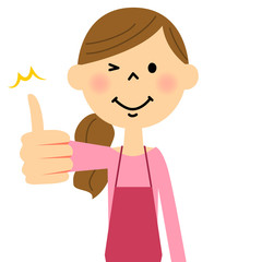 サムズアップするエプロンの女性