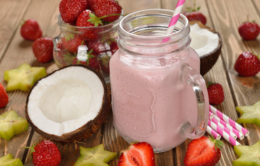 Cocktail with coconut milk and strawberries