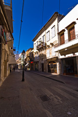 Fototapeta na wymiar Street with shops at the old medieval part of the city Rethymno, Crete, Greece
