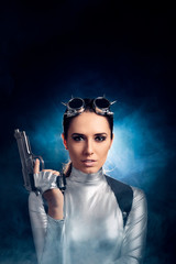 Woman in Silver Space Costume Holding Pistol Gun