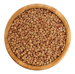 Wooden bowl with lentils isolated on white background.