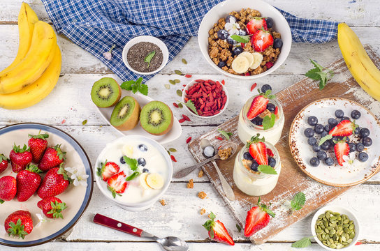 Healthy breakfast with yogurt, fruits and berries.