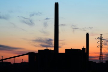 Fototapeta na wymiar Coal power plant at sunset in Helsinki