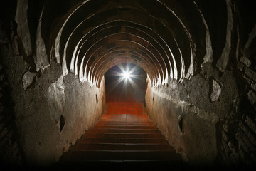 tunnel background and business concept. tunnel with old brick. the end of tunnel and concept...