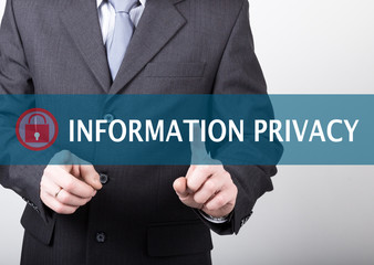 technology, internet and networking concept - Businessman presses information privacy button on virtual screens. Internet technologies in business