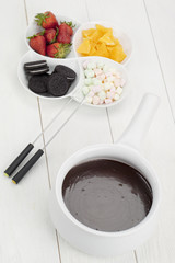 tempting desserts with melted chocolate bowl
